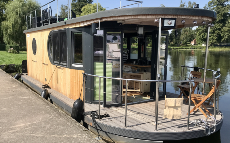 Hausboot MoDo HAUSBOOT - Familie - Abenteuer - Romantik - Rückzugsort Bild 1